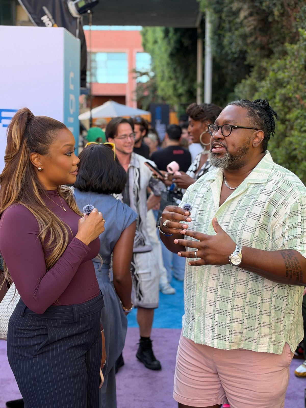 Monica Bowie interviewing an entrepreneur on the carpet at BLACKWEEK LA